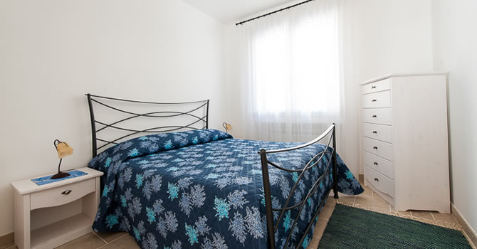 Immagine della camera da letto dell’appartamento Gelsomino